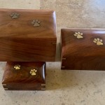 Handmade mahogany with brass paw print casket